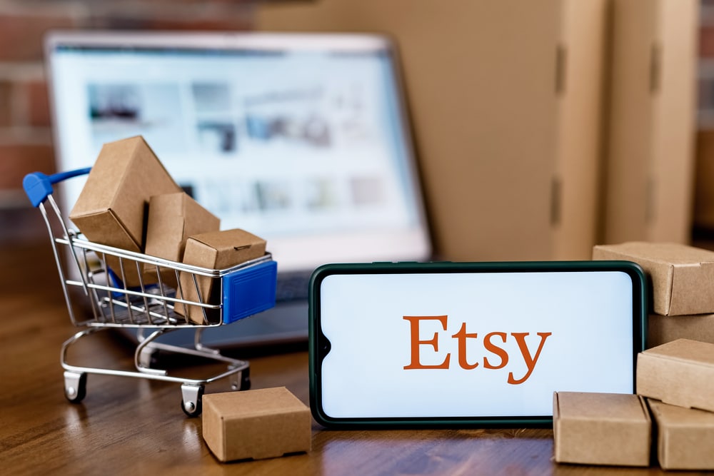 Etsy on Phone with Tiny Shopping Cart