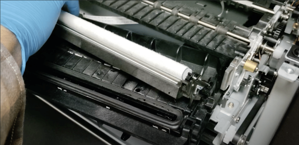 Step 5d Re-place wiper roller in the assembly